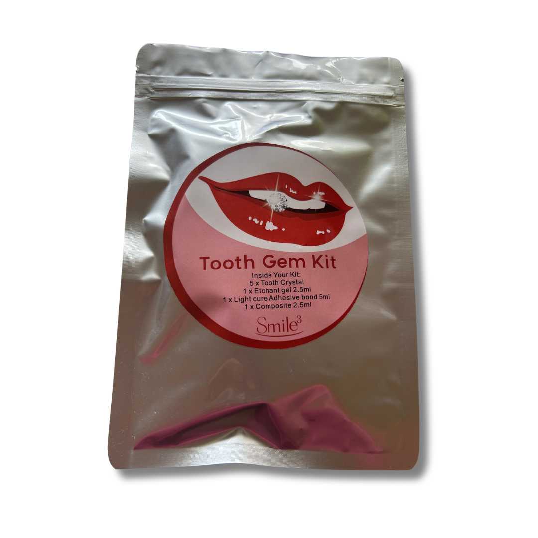 Tooth gem starter KIT, includes dental etchant, dental bond and adhesive, application tips and a variety of crystal gems